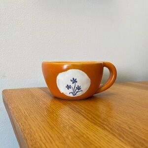 Orange Ceramic Mug with Floral Design